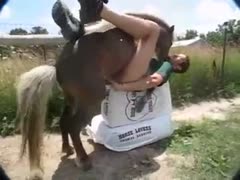 Slender man lays on his back while out on the ranch with no bottoms and welcomes brute sex